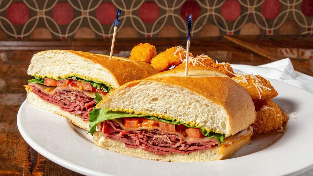 Hot Pastrami · Lean pastrami with sharp Swiss, spicy horseradish mayo, lettuce, tomato, and spicy brown mustard served on a French roll.