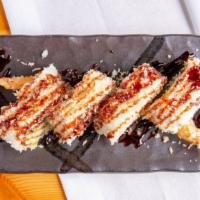 Crunchyroll · In shrimp tempura, crab meat, avocado and cucumber. Out: crunch and unagi sauce.