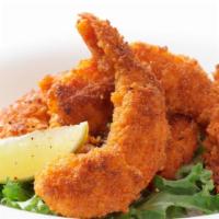 Jumbo Shrimp Dinner · 4 jumbo, golden fried shrimp. Served with fresh side salad, soft roll, golden french fries a...
