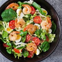 Shrimp Salad · Plump, grilled shrimp on a bed of crisp greens and fresh seasonal vegetables.