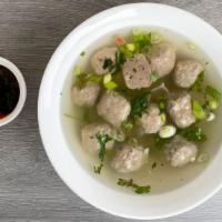 Súp Bò Viên · Beef ball soup with chiken broth, green onion, cilantro and beef balls.