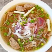 Phở Bò · Beef Rice Noodles Soup with Rare Sliced Beef, Well- done Flank, Tendon and Beef Balls