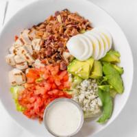 Cobb Salad · Romaine and iceberg lettuce, chicken, bacon, avocado, tomatoes, Bleu cheese, hard-boiled egg...