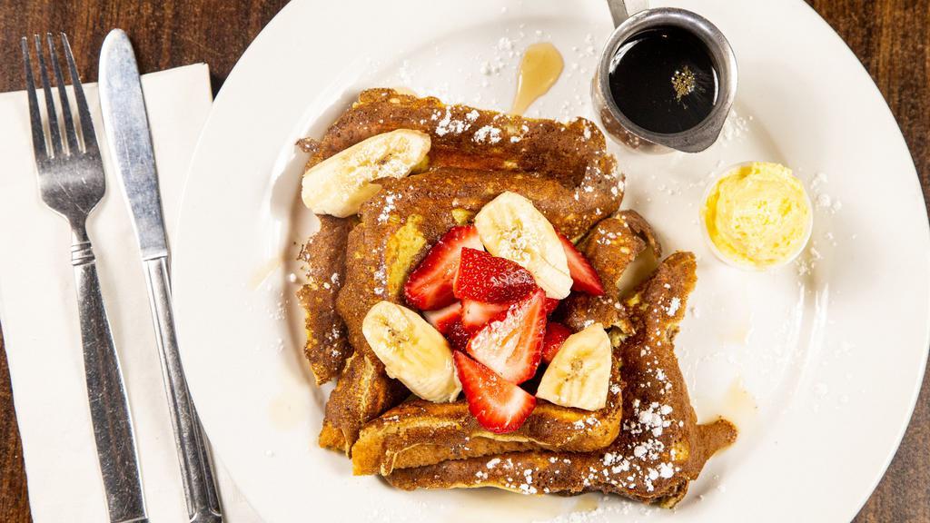 French Toast Combo · Two eggs any style, choice of bacon or sausage and two French Toast