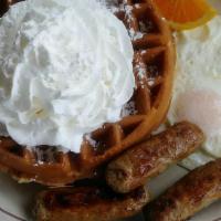 Waffle Combo · Served with a choice of bacon or sausage with two eggs any style