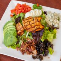Cobb Salad · Mixed greens topped with chicken breast, boiled eggs, tomatoes, bacon,avocado, blue cheese, ...