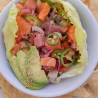 Baja Ceviche · salmon, tuna, & yellowtail marinated in lemon citrus with pico de gallo, avocado, & crispy h...