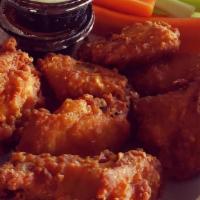 Chicken Wings · Wet or dry with choice of sauce (traditional hot, teriyaki, spicy szechuan). Served with ran...
