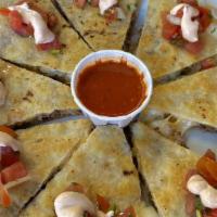 Quesadilla · Chicken or carnitas, cheddar and jack cheese, roasted poblano chile, chipotle sour cream and...