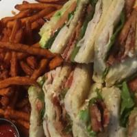 Clubhouse  · Turkey breast, avocado, applewood smoked bacon, tomato, lettuce and mayonnaise on toasted so...