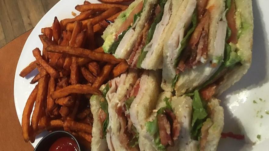 Clubhouse  · Turkey breast, avocado, applewood smoked bacon, tomato, lettuce and mayonnaise on toasted sourdough