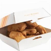 12Pc 'Chicken' Nuggets · A large order of crispy 'chicken' nuggets. Includes one sauce of your choice on the side.