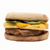 Muffin - 'Sausage Egg & Cheese' · 'Sausage,' JUST Egg, American 'cheese,' and spinach on a buttered and toasted English muffin.
