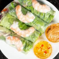 Fresh Spring Rolls Shrimp (4) · Rice paper wrapped in lettuce, cabbage, carrots, bean sprouts, mints, cilantro, cucumber, an...