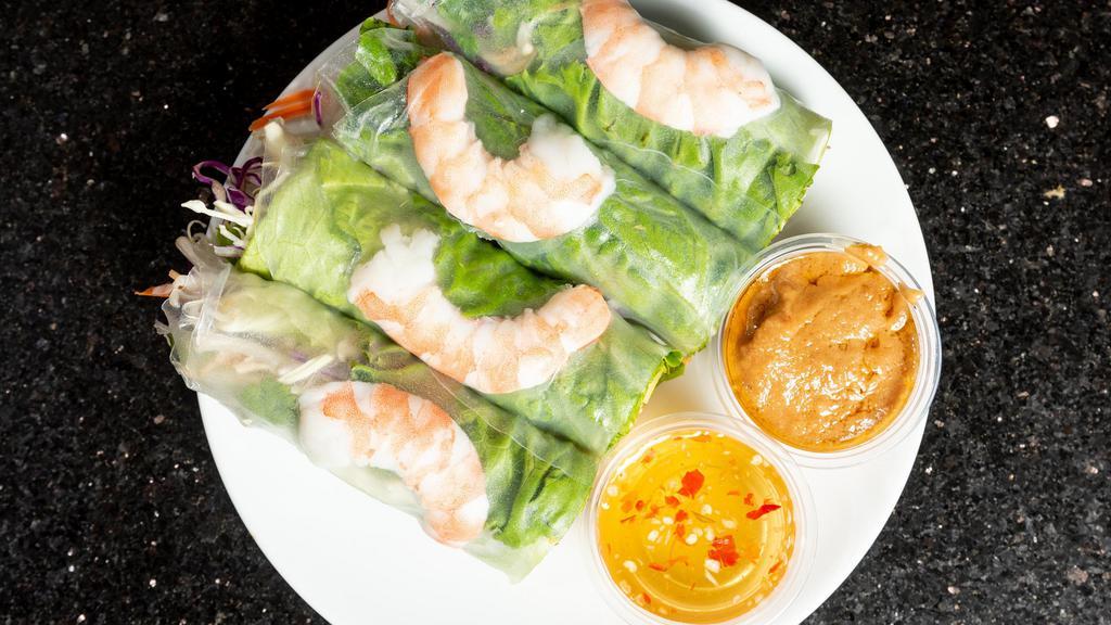 Fresh Spring Rolls Shrimp (4) · Rice paper wrapped in lettuce, cabbage, carrots, bean sprouts, mints, cilantro, cucumber, and rice noodles. Served with peanut sauce and sweet sauce topped with peanuts.