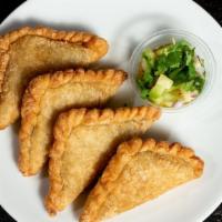 Thai Curry Puffs · Minced beef, potatoes, peas and carrots mixed with Thai curry powder wrapped in puff pastry,...