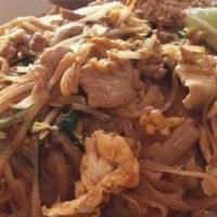 Peanut Sauce Noodles · Pan fried wide rice noodles with egg. Your choice of meat topped with peanut sauce.