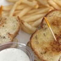 Tuna Melt · Homemade albacore tuna salad, Swiss cheese and grilled onions served on grilled rye. With ch...