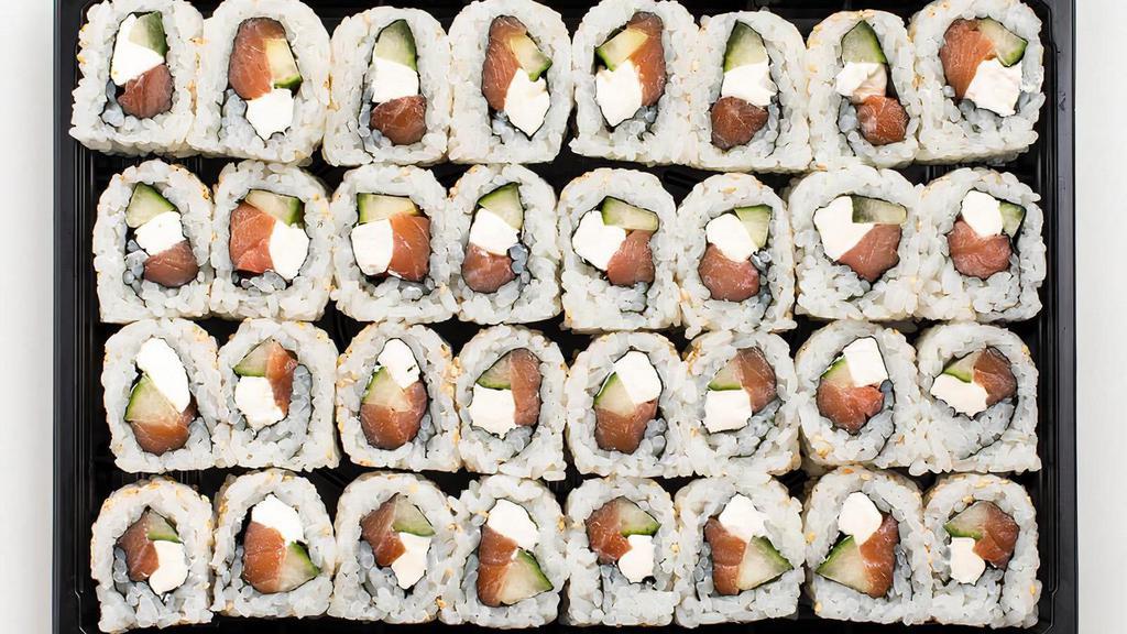 Philadelphia Roll · Smoked salmon, cream cheese and cucumber rolled in seaweed and rice