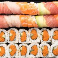 Rainbow† & Spicy Tuna Roll · Rainbow Roll: The classic California Roll† topped with tuna, yellowtail, shrimp, salmon and ...