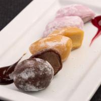 Sweet Mochi Trio · A traditional Japanese ice cream dessert wrapped in sweet rice cake; your choice of three fl...