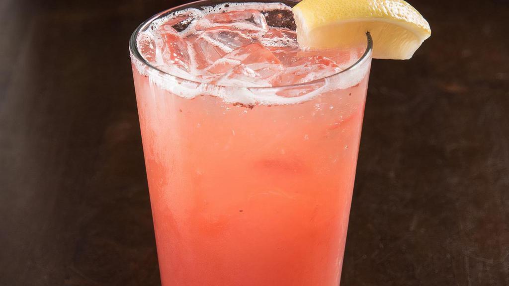 Spiked Strawberry Lemonade · Tito's Vodka mixed with our homemade strawberry lemonade