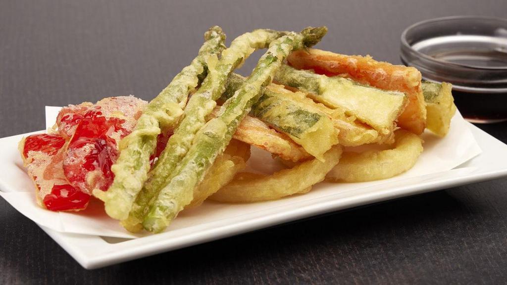 Vegetable Tempura · A combination of carrots, asparagus, zucchini and onion rings