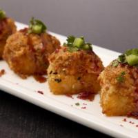 Hot Mess · Crispy rice topped with a lobster mix; baked and finished with jalapeños and cilantro; toppe...
