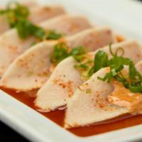 Chili Garlic Albacore Tuna* · Thinly sliced albacore with chili ponzu sauce; topped with chili mayo, green onions and garl...