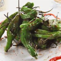 Shishito Peppers · Shishito peppers sautéed in Asian garlic sauce.