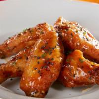 Black Pepper Teriyaki Wings · Lightly breaded and fried to perfection. Tossed in a Black Pepper Teriyaki Sauce.