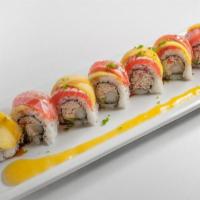 Mango Shrimp Roll · Krab† mix, shrimp tempura, avocado and cucumber rolled and topped with lightly seared salmon...