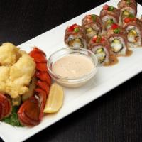 Lobster Filet Mignon Roll · Lobster tempura and avocado rolled and topped with seared filet mignon, creamy wasabi sauce,...