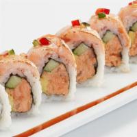 Smoky Salmon Roll* · Smoky salmon mix, cucumber and avocado, rolled and topped with lightly torched salmon and re...