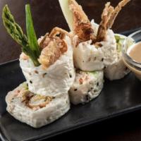 Soft Shell Crab Roll  · A whole fried soft shell crab, asparagus, avocado, cucumber, and krab† mix rolled in soy pap...