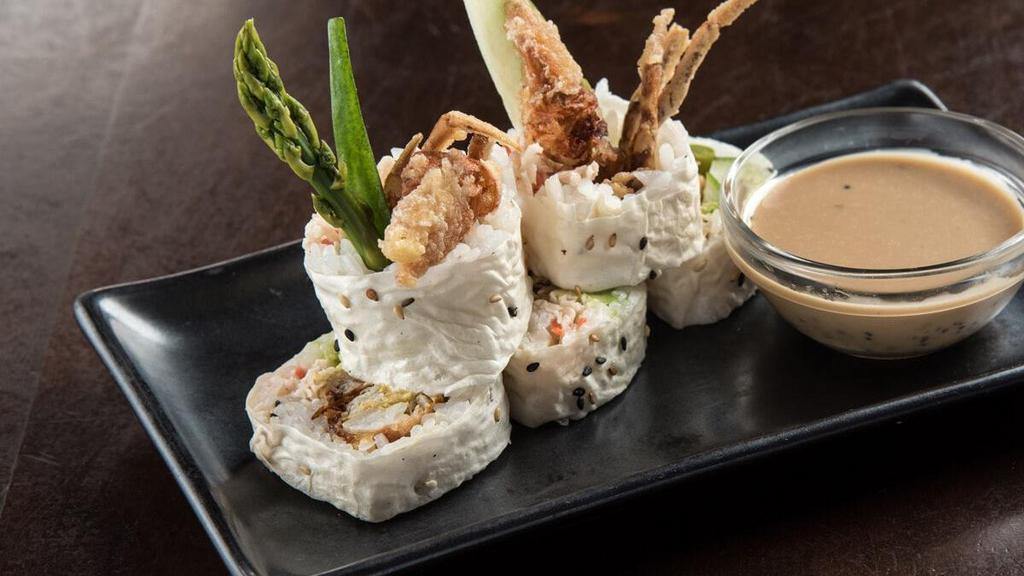 Soft Shell Crab Roll  · A whole fried soft shell crab, asparagus, avocado, cucumber, and krab† mix rolled in soy paper and rice