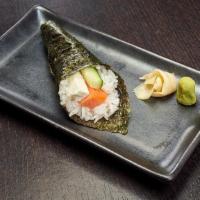 Philadelphia Hand Roll · Cone shaped roll with smoked salmon, cream cheese and cucumber rolled in rice and seaweed.