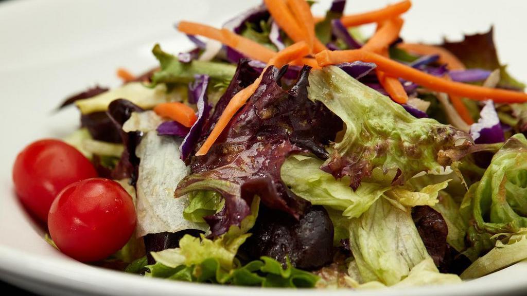 Uchi No Salad · Mixed greens, red cabbage, carrots and grape tomatoes tossed in ginger dressing,