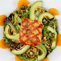Nutty Grilled Salmon Salad · Grilled Salmon tossed with cashews, edamame, carrots and mixed greens in Japanese vinaigrett...
