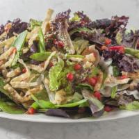 Uchi No Salad · Mixed greens tossed in soy ginger. vinaigrette, topped with red bell. peppers and fried wont...
