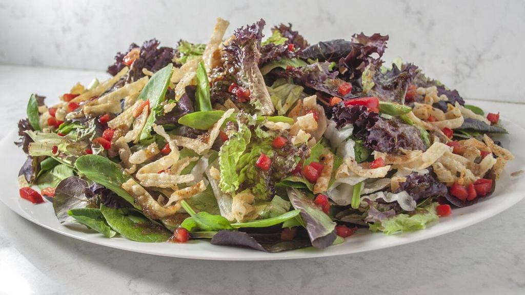 Uchi No Salad · Mixed greens tossed in soy ginger. vinaigrette, topped with red bell. peppers and fried wontons