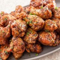 Wings · Lightly breaded and fried to. perfection. Tossed in your choice. of: BLACK PEPPER TERIYAKI, ...
