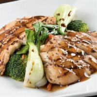 Chicken Teriyaki · Grilled chicken served with steamed rice and Asian vegetables