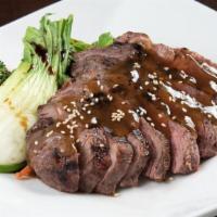 Beef Teriyaki · Grilled beef served with steamed rice and Asian vegetables