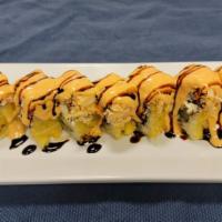 Golden Tiger Roll · Cream cheese, avocado, shrimp tempura, deep-fried with spicy crabmeat.