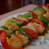 Shrimp Kabob Plate · 2 skewers pita bread garlic sauce and a choice of two sides