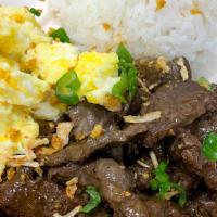 Side Of Beef Tapa · Beef tapa is a popular Filipino breakfast dish where the beef is marinated and sauteéd serve...