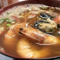 Spicy Seafood Udon · Served with spicy udon soup, noodles, assorted seafood and rice