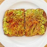 Avocado Toast · Wheat Poppy Toast – Mashed Avocado – Himalayan Salt – Paprika – Lemon.