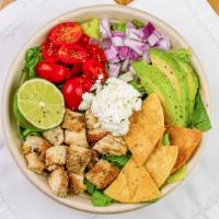 Syde Chick Salad · Grilled chicken, romaine, avocado, red onion, Goat cheese, tortilla chips, tomatoes, jugo ho...